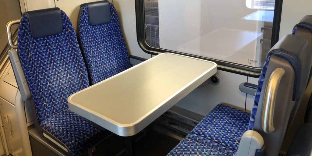 Table seating, TexRail Stadler FLIRT EMU.